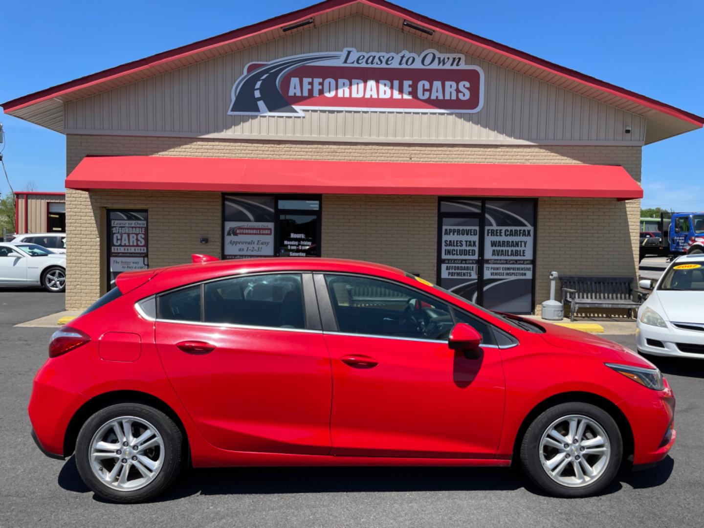 2017 Red Chevrolet Cruze (3G1BE6SM5HS) with an 4-Cyl, Turbo, 1.4 Liter engine, Automatic, 6-Spd transmission, located at 8008 Warden Rd, Sherwood, AR, 72120, (501) 801-6100, 34.830078, -92.186684 - Photo#0